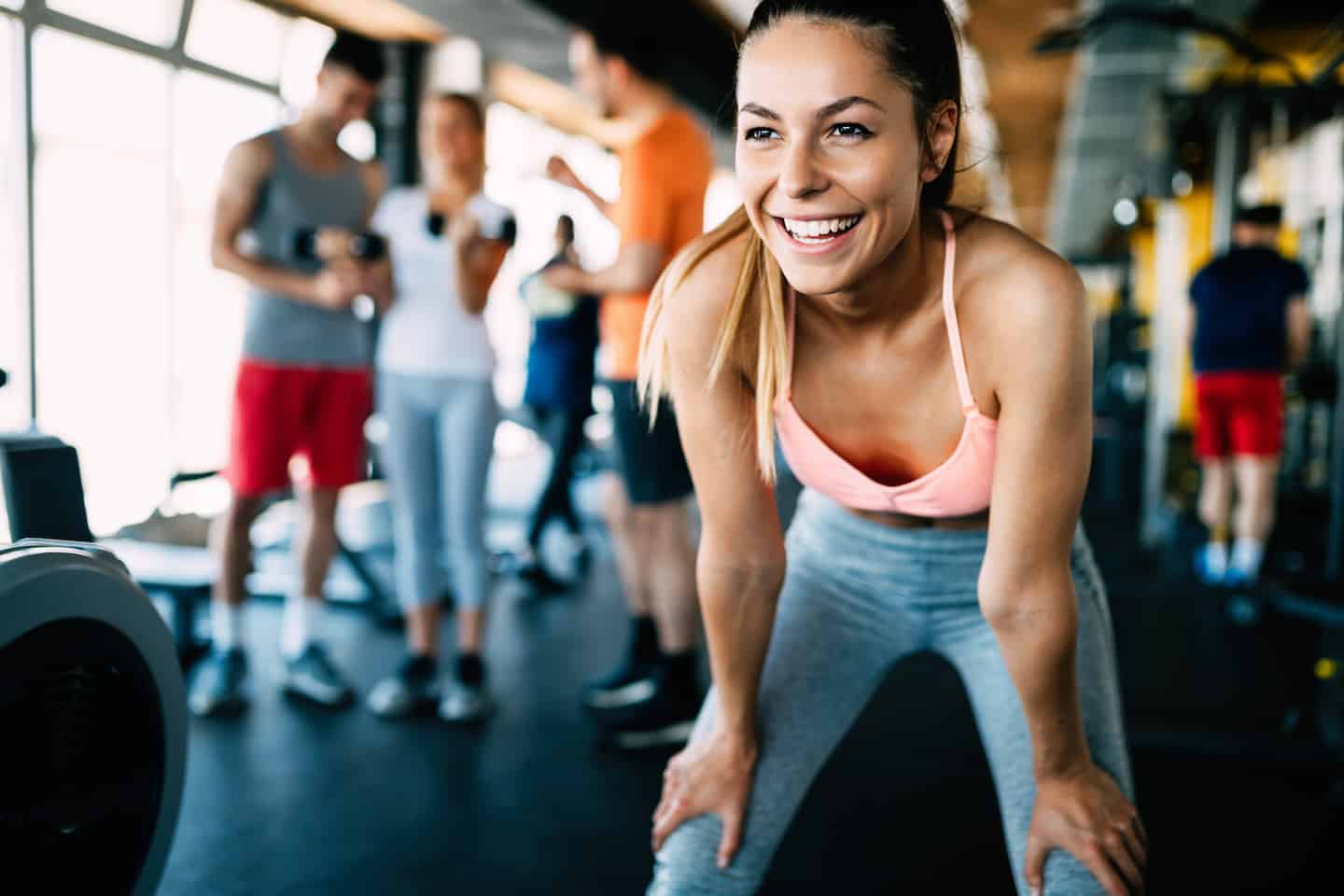 fitness instructor smiling after gym workout