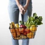 Instacart shopper holding groceries