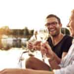 Couple enjoying wine on a boat