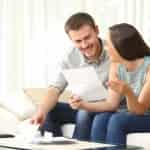couple looking at a bank statement