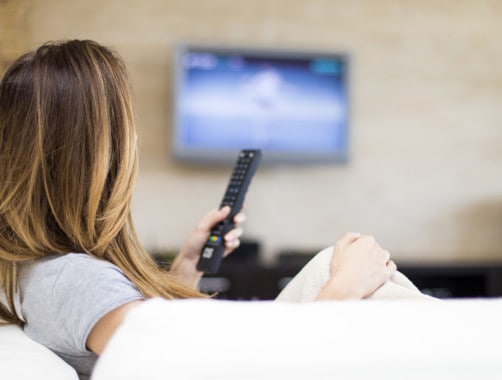 woman watching cable tv alternatives