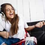 woman listening to music on Spotify