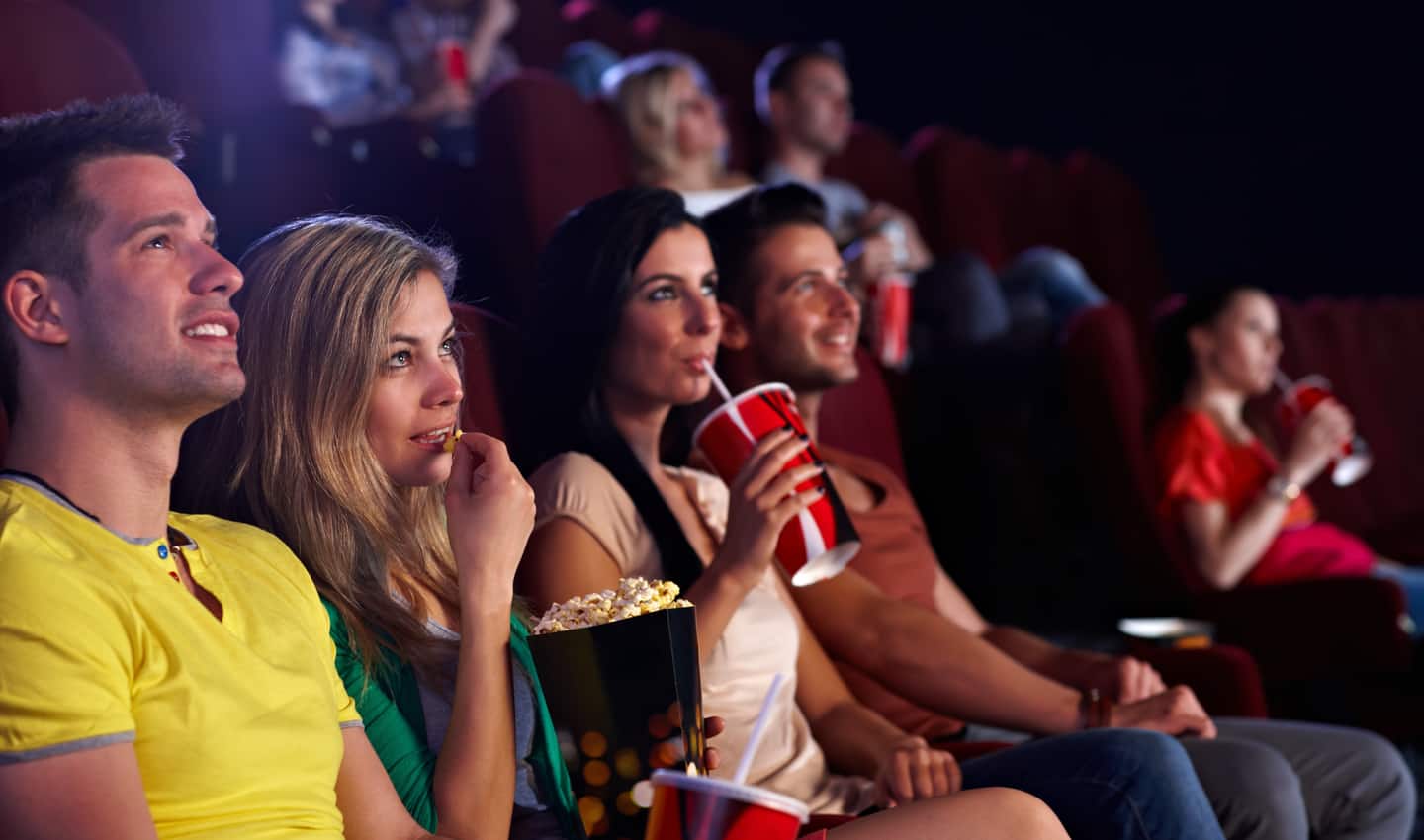 two couples enjoying a matinee showing