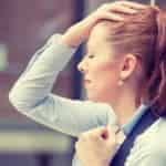 frustrated woman outside of workplace