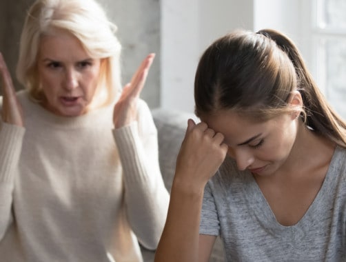 woman arguing with her mother about finances