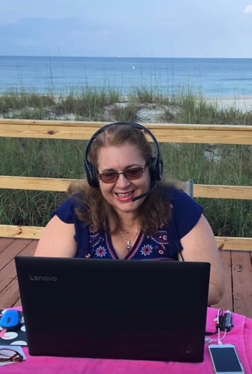 Laura Saulters Teaching with VIPKid Outside at the Beach