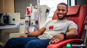 A healthy African American male donating plasma.