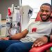 A healthy African American male donating plasma.