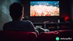 A man alone in his dark living room watching Netflix.