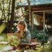 A woman working on her laptop outside