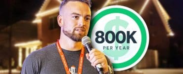Steve Hunsaker, founder of a seasonal light-hanging side hustle, speaks into a microphone while wearing a Valley Christmas Lights t-shirt. A house lit with holiday lights glows in the background.